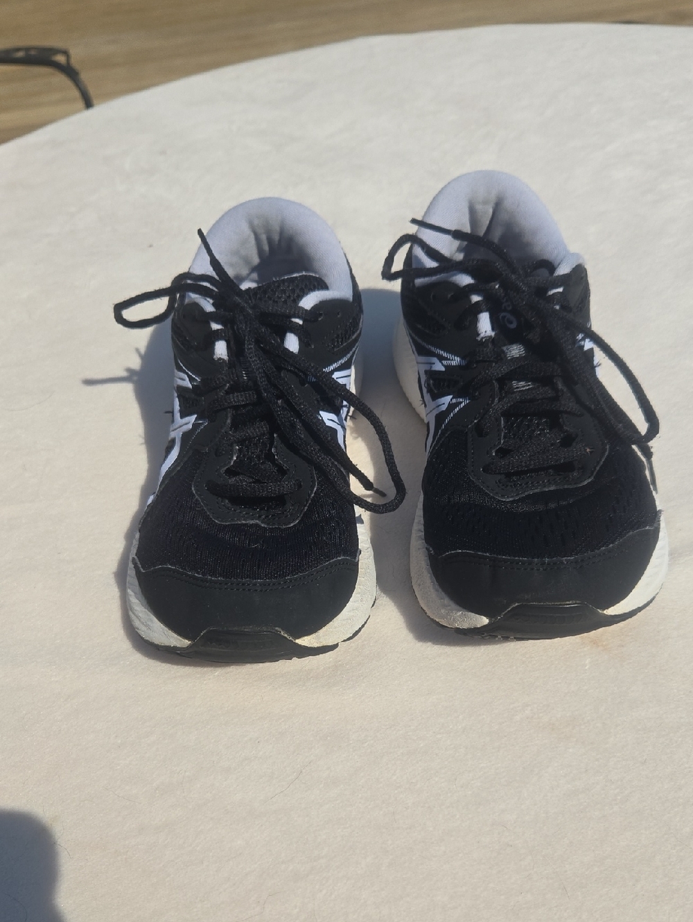 Asics Womens  Sneakers Black with light blue trim and white soles Size 10